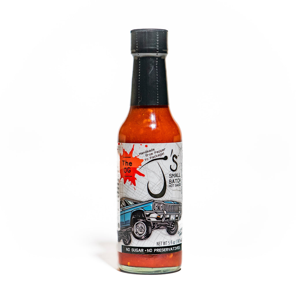 Hot sauce bottle with a colorful label on a white background
