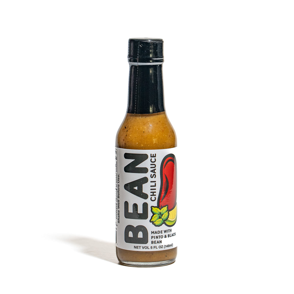 Bottle of Bean chili sauce on a white background