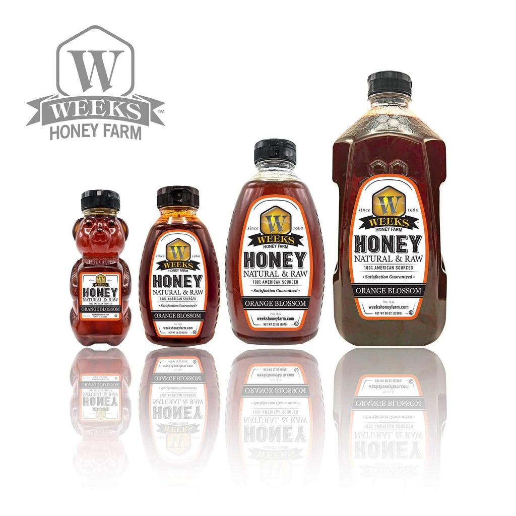 unfiltered orange blossom honey bottles from Weeks Honey Farm, showcasing natural raw honey varieties.